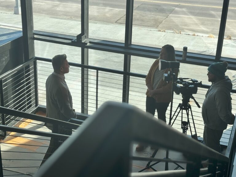 USD Discovery District President and CEO speaks to local news to promote the 2025 Ribbon Cutting event for USD Discovery District.