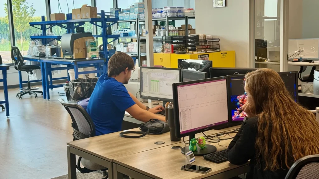 OmegaQuant team members analyze data and run diagnostic reports from their new office and lab environment inside Building 1. Photo courtesy of SiouxFalls.Business.