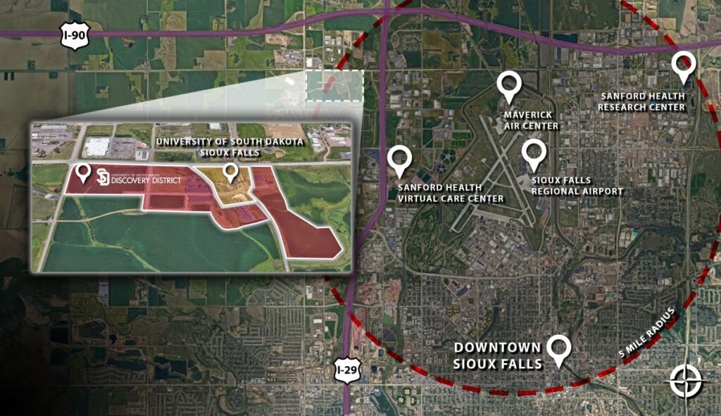 Map showing the USD Discovery District highlighted within Sioux Falls, marked alongside Sanford Health facilities, the airport, downtown, and major highways.