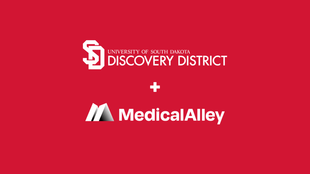 USD Discovery District logo + Medical Alley logo on red background